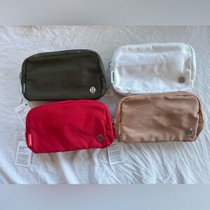 Winter festive holiday color bundle set lululemon belt bag red white green brown